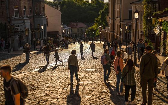 Pedestrians walk along a popular street in Kyiv, Ukraine, April 27. (AP/Francisco Seco)