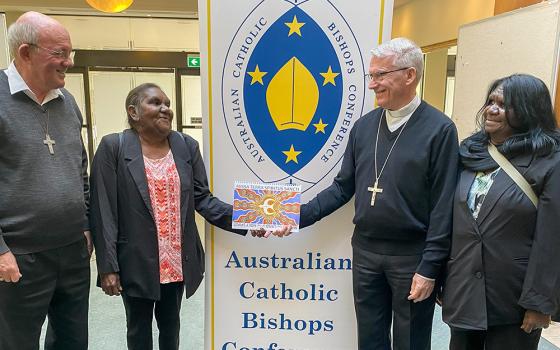 From left: Bishop Michael Morrissey, apostolic administrator of the Broome Diocese; Aboriginal elder Madeleine Jadai; Perth Archbishop Timothy Costelloe, president of the Australia Catholic Bishops Conference; and Aboriginal elder Maureen Yanawana, in Sydney for the presentation of the Mass of the Land of the Holy Spirit on May 7 (Courtesy of Australian Catholic Bishops Conference/Paul Osborne)