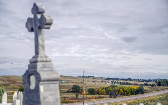 Pine Ridge Indian Reservation is seen from the burial place of 19th-century Chief Red Cloud Sept. 30, 2021 in Pine Ridge, South Dakota. Red Cloud defended against U.S. land grabs as long as he could but converted to Catholicism and invited the Jesuits to start Holy Rosary Mission after he and his people were confined to Pine Ridge. (AP/Emily Leshner)