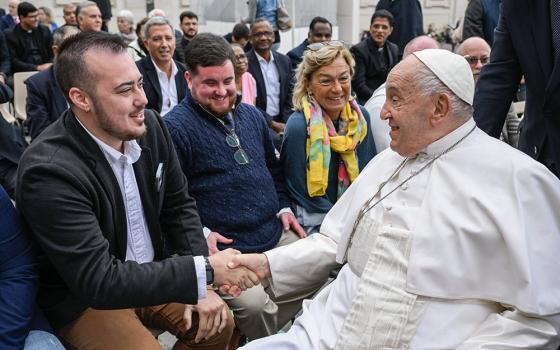 On Oct. 23, Maxwell Kuzma meets Pope Francis after a general audience as part of a group of transgender Catholic men gathered through Outreach. (Courtesy of Outreach)