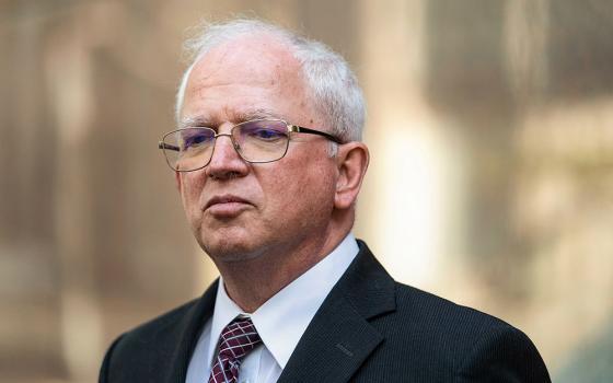 Attorney John Eastman, an architect of a legal strategy aimed at keeping former President Donald Trump in power, listens to questions from reporters after a hearing in Los Angeles June 20, 2023. (AP/Jae C. Hong)