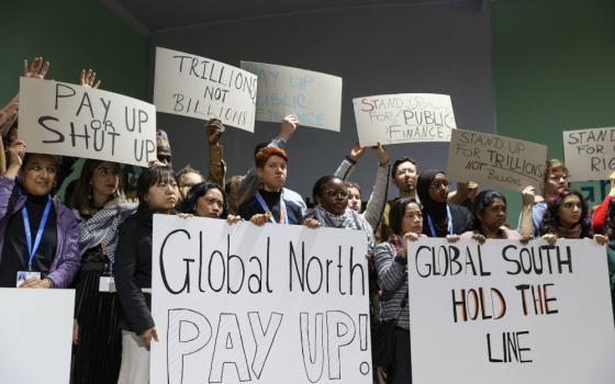 Climate activists hold a demonstration in response to a target for financing climate change responses under negotiation at the United Nations climate change conference, in Baku, Azerbaijan. The summit, called COP29, ultimately struck a deal for $300 billion by 2035 for developing countries. (UN Climate Change/Kiara Worth)