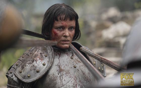 A blood-spattered O'Prey wears armor. 