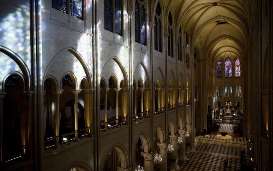 Elevated and angled view of the vast open space of the Cathedral's nave.