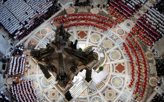 Cardinals attend the opening Mass of the conclave in St. Peter's Basilica at the Vatican on April 18, 2005. Cardinals under the age of 80 processed into the Sistine Chapel about five hours after the Mass to begin the secret process of electing a new pontiff. German Cardinal Joseph Ratzinger was elected the 265th pope and chose the name Benedict XVI. (CNS/Reuters)