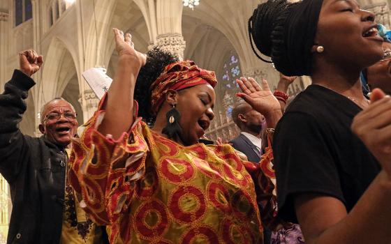 Members of the Mixed African Choir of St. Augustine-Our Lady of Victory Parish in the Bronx, N.Y., sing during the annual Black History Month Mass at St. Patrick's Cathedral in New York Feb. 5, 2017. (CNS/Gregory A. Shemitz)
