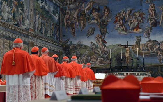 Cardinals from around the world line up in the Vatican's Sistine Chapel March 12, 2013, to take their oaths at the beginning of the conclave to elect a successor to Pope Benedict XVI. The following day, on the fifth ballot, they elected Cardinal Jorge Mario Bergoglio of Buenos Aires, Argentina, who chose the name Francis. (CNS/Vatican Media)