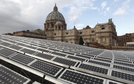 Solar panels are seen on the roof of the Paul VI audience hall at the Vatican in this Dec. 1, 2010, file photo. Pope Francis released his landmark environmental encyclical "Laudato Si', on Care for Our Common Home" 10 years ago on May 12, 2015. (CNS/Paul Haring)