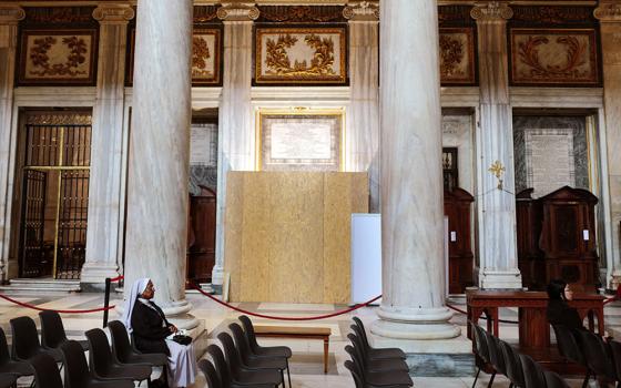 A nun prays near the site for the tomb of Pope Francis at Rome's Basilica of St. Mary Major April 25, 2025, where the pope is to be buried April 26. Pope Francis, formerly Argentine Cardinal Jorge Mario Bergoglio, died April 21 at age 88. (OSV News/Reuters/Kai Pfaffenbach)
