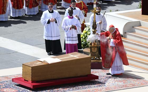 Cardinal Giovanni Battista Re, dean of the College of Cardinals, blesses the coffin as he leads the funeral Mass of Pope Francis in St. Peter's Square at the Vatican on April 26, 2025. (OSV News/Vatican Media)