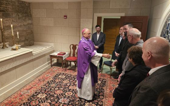 Louisville Archbishop Shelton Fabre greets attendees at The Way Forward after Mass 