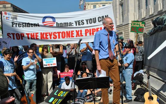 Bill McKibben speaks at a "Stop the Keystone XL" pipeline rally, outside a State Department hearing at the Ronald Reagan building in Washington, on Oct. 7, 2011. (Wikimedia Commons/chesapeakeclimate, CC BY SA 2.0)