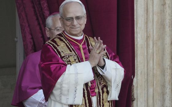 Newly elected Pope Leone XIV appears at the balcony of St. Peter's Basilica at the Vatican, May 8, 2025. (AP Photo/Markus Schreiber)