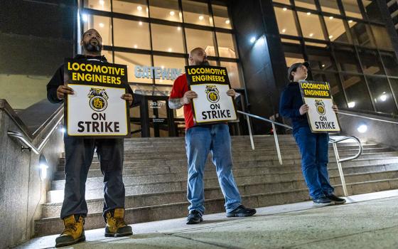 Union members from the Brotherhood of Locomotive Engineers and Trainmen form a picket line outside the NJ Transit headquarters on May 16, 2025 in Newark, New Jersey. (AP/Stefan Jeremiah)