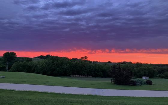 The sun sets over the Benedictine Monastery in Clyde, Missouri, in August 2025. (Helen Mueting)