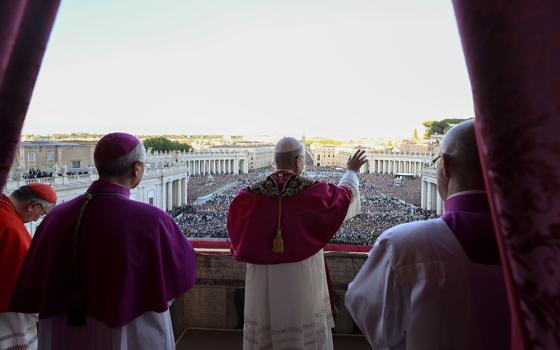 Pope Leo XIV, the former Cardinal Robert Francis Prevost, waves after walking onto the central balcony of St. Peter's Basilica at the Vatican May 8, 2025, following his election during the conclave. (OSV News/Catholic Press photo/Vatican Media)