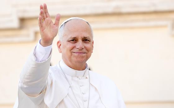 Pope Leo XIV greets people from the popemobile while riding through St. Peter's Square at the Vatican Nov. 1, 2025, after celebrating Mass. (CNS/Lola Gomez)