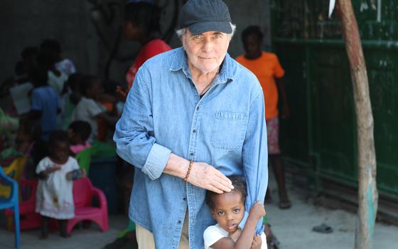 Gerry Straub is pictured with Baby Ruth in April 2019 at the Santa Chiara Children's Center in Port-au-Prince, Haiti. Straub founded the home for abandoned and abused kids in May 2015. (Courtesy of Gerry Straub)