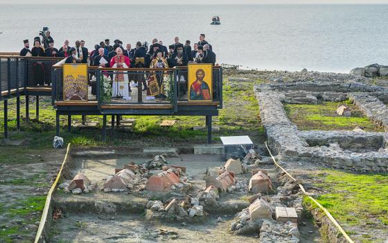 Pope Leo XIV and Ecumenical Patriarch Bartholomew lead a prayer service near the archaeological excavations of the ancient Basilica of St. Neophytos in Iznik, Turkey, Nov. 28, 2025. (AP/Domenico Stinellis)