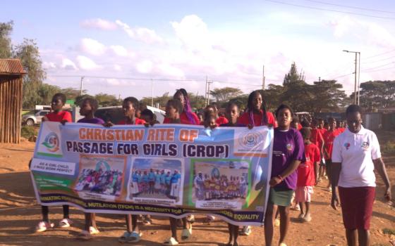 Girls rescued from female genital cutting march through the streets of Suguta Marmar in northern Kenya to educate the community about the harms of the practice.