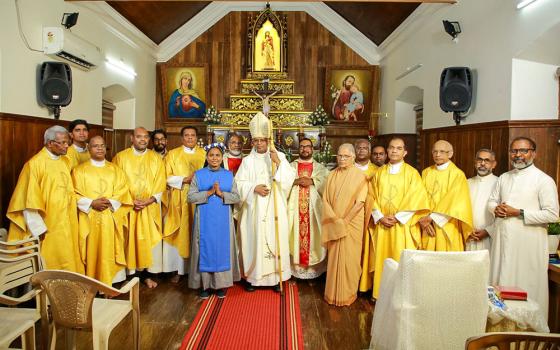 Sr. Jomol Kreupasanam, a member of the Order of Sacred Virgins, poses for a photo with Bishop James Raphael Anaparambil (center) and Fr. Joseph Valiyaveettil (center right), founder of the Kreupasanam center in the Alleppey Diocese in the southwestern Indian state of Kerala. Also seen is formator Canossian Sr. Margaret Peter, during Sister Jomol's consecration to perpetual virginity on Nov. 21, 2025. (Kreupasanam Media Vision)