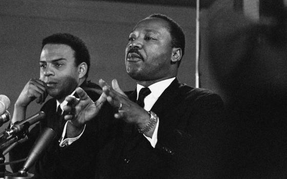 The Rev. Andrew Young, executive vice president of the Southern Conference (left), appears with Martin Luther King Jr., president of the Southern Christian Leadership Conference, on Feb. 7, 1968. (AP)