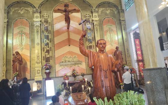 A wooden statue depicting Fr. Francis Xavier Truong Buu Diep stands at the Tac Say Pilgrimage Center. Diep, who was martyred in 1946 and is to be beatified July 2 at the center in southern Ca Mau province, Vietnam. (Reporter in Vietnam)