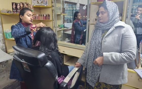 A beautician trainee works at New Life Ministry, a small vocational training center Sr. Rita Samson, a "secular nun," founded in 2005 in Youhanabad, a low-income Christian neighborhood on the outskirts of Lahore, Pakistan. (Kamran Chaudhry)