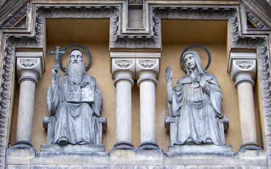 Statues of St. Benedict and his sister, St. Scholastica, above the entrance of the Church of the Annunciation, also called "St. Gabriel Church," in Prague (Wikimedia Commons/ŠJů)