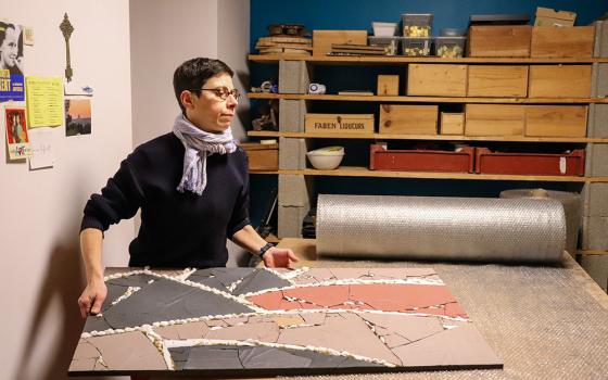 Mosaic artist Sister Samuelle in her workshop in France. Samuelle, who accused disgraced priest artist Marko Rupnik of abuse, is now a hermit and the creative lead on "Rebirth," a monumental mosaic dedicated to the victims of spiritual and sexual abuse in the church. (Courtesy of "Rebirth: The Tesserae Symphony")