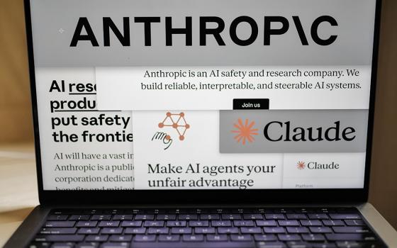 Pages from the Anthropic website and the company's logos are displayed on a computer screen in New York on Feb. 26, 2026. (AP/Patrick Sison)