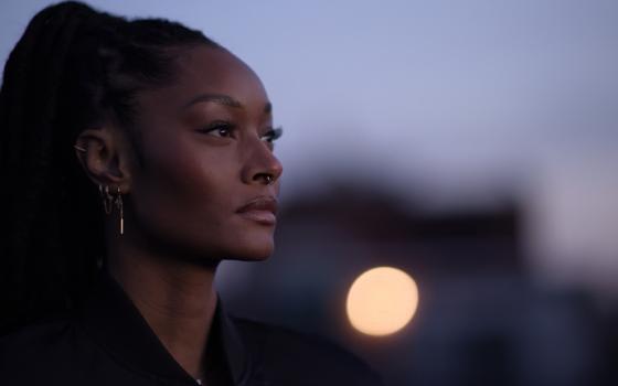 Contestant Dani Evans was pressured by "America's Next Top Model" judges into having a medical procedure to close the gap between her front teeth despite her own desire to leave her smile natural. On "Reality Check," Tyra Banks said she had already "actually apologized" to Evans. (Netflix)