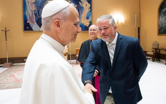 Dylan Corbett, executive director of the Hope Border Institute in El Paso, Texas, meeting Pope Leo XIV at the Vatican, in October 2025. (Courtesy of Vatican Media)