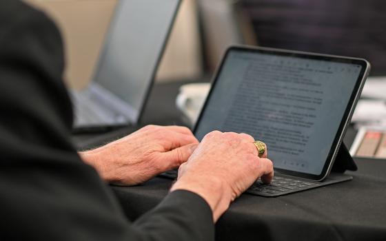 A participant takes notes during the fifth annual Way Forward ecclesial gathering, held Feb. 25-27, 2026, at the University of St. Thomas in St. Paul, Minnesota. (Courtesy of University of St. Thomas/Nick Wosika)