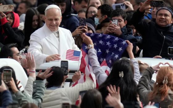 Pope Leo XIV arrives for his weekly general audience in St. Peter’s Square at the Vatican, April 1, 2026. 