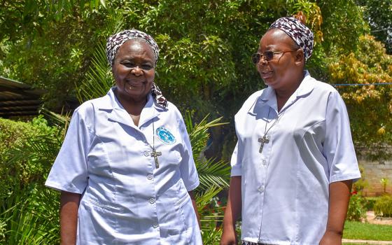 Sr. Rose Nyondo, the program director for the Community Transformation Programme, and project coordinator Sr. Matilda Mubanga. The program, run by the Daughters of the Redeemer, promotes agricultural productivity in Chibombo and other areas in Zambia. (Derrick Silimina)