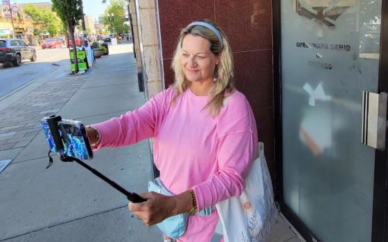 Rev. Vicki Garlock takes a selfie outside Devon Gurdwara Sahib of Chicago, a Sikh religious site, during her trip to obtain the Guinness World Record for most places of worship visited in one month, September 2025. The Gurdwara was one of 185 places of worship she visited. (Courtesy of Vicki Garlock)