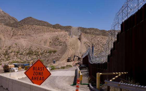 Contractors are using explosives to carve out the side of the landmark Cristo Rey mountain that oversees two countries and three states. (Gaby Velasquez/Puente News Collaborative)