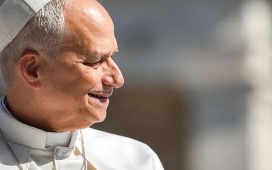 Pope Leo XIV smiles as he greets visitors and pilgrims from the popemobile while riding around St. Peter’s Square at the Vatican before his weekly general audience May 20, 2026. Leo wrote a message to graduates of his alma mater Villanova University that Augustinian Fr. Peter Donohue read at the university's commencement on May 19, 2026. (CNS/Lola Gomez)