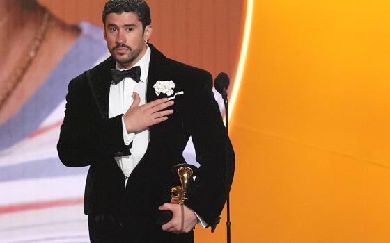 Bad Bunny accepts the award for album of the year for "Debí Tirar Más Fotos" during the 68th annual Grammy Awards on Sunday, Feb. 1, 2026, in Los Angeles. (AP photo/Chris Pizzello)
