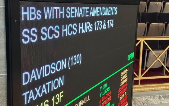 An electronic voting board in the Missouri House chamber displays the title of a proposed constitutional amendment to phase out the individual income tax April 21, 2026, in Jefferson City, Mo. The proposed amendment is on the Aug. 4 primary ballot. (AP/David Lieb)