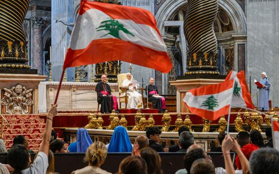 Visitors from Lebanon wave flags during Pope Leo XIV's weekly general audience in St. Peter’s Basilica at the Vatican Aug. 19, 2026. Lebanese President Joseph Aoun met with Leo at the Vatican Aug. 20. (CNS/Vatican Media)