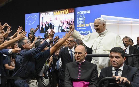 Pope Leo XIV greets people attending the Meeting for Friendship Among Peoples, hosted by the Catholic lay movement, Communion and Liberation, in Rimini, Italy, Aug. 22, 2026. (CNS/Vatican Media) 