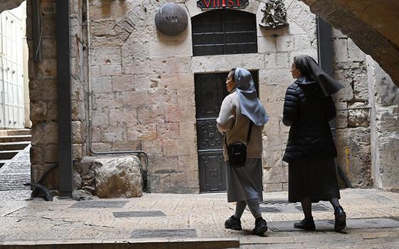 Nuns walk near the seventh station of the cross on Good Friday, in the Old City of Jerusalem, April 3, 2026. (OSV News/Debbie Hill)