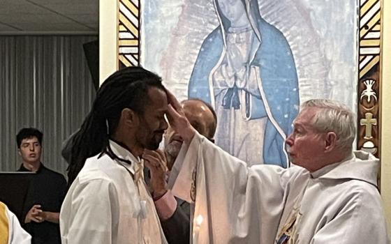 Cam Obi, a music producer and musician who has worked with some of the biggest names in hip-hop and R&B, converted to Catholicism at the Easter Vigil. He was baptized at Prince of Peace Catholic Church in Albuquerque, New Mexico. (Courtesy of Cam Obi)