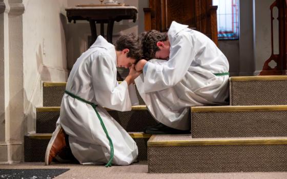 Julius Rinzel and Ivan Howe play teenage altar servers in "The Saviors," written by Bubba Weiler and directed by Jack Serio. The off-Broadway show is produced by the Atlantic Theater Company in New York City. (Ahron R. Foster)