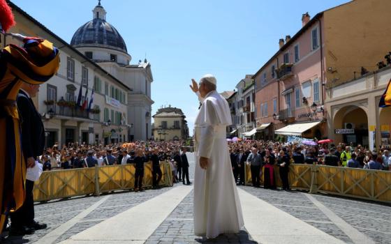 Pope Leo XIV greets people in Piazza della Liberta in Castel Gandolfo near Rome Aug. 16, 2026. After leading the Angelus prayer, the pope decried the violence in the West Bank and called on the international community to "work toward advancing the two-state solution." (OSV News/Vatican Media/Simone Risoluti)