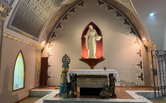 A marble sculpture depicting Blessed María del Tránsito Cabanillas with her little basket stands at a shrine at the motherhouse of the Franciscan Tertiary Missionary Sisters in Córdoba, Argentina. (GSR photo/Helga Leija)
