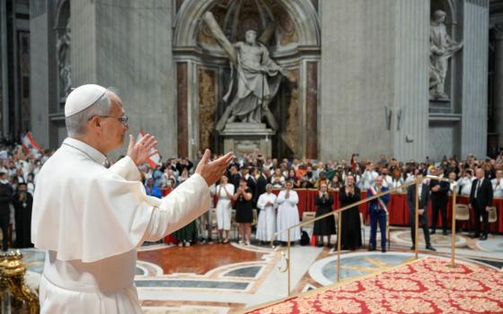 Pope Leo XIV greets visitors and pilgrims during his weekly general audience in St. Peter's Basilica at the Vatican Aug. 19, 2026. (CNS/Vatican Media)