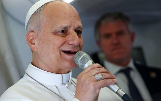 Pope Leo XIV speaks to members of the media aboard the papal plane April 15, 2026, en route to Yaounde, Cameroon. Leo will visit 10 cities in South America during his apostolic journey to Uruguay, Argentina and Peru Nov. 6-17. (OSV News/Pool/Guglielmo Mangiapane)